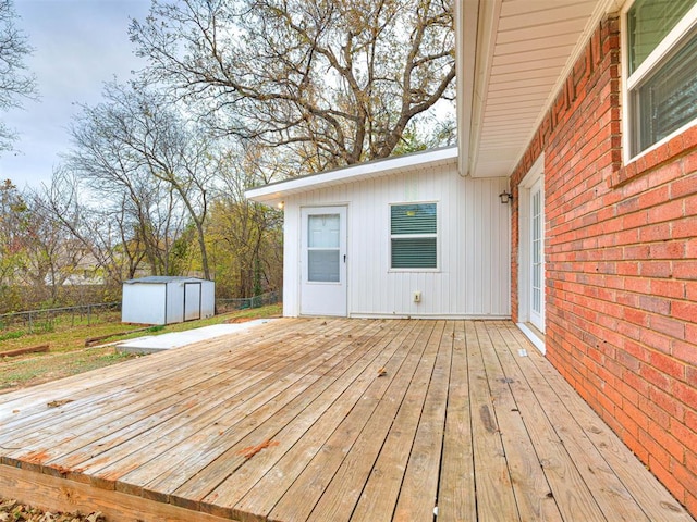 wooden terrace with a storage unit