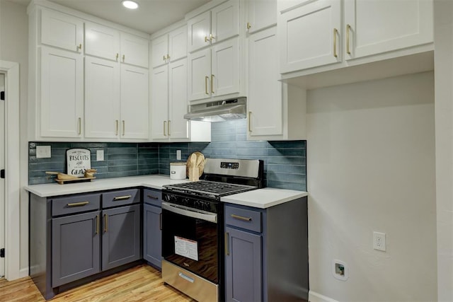 kitchen with white cabinets, gas range, light hardwood / wood-style floors, and gray cabinetry