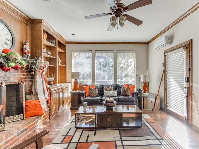 living room featuring light wood-type flooring, ornamental molding, ceiling fan, an AC wall unit, and a fireplace