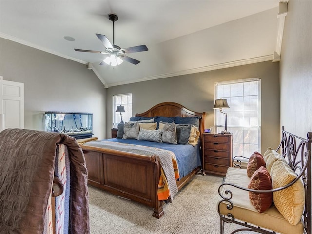 carpeted bedroom featuring ceiling fan, ornamental molding, multiple windows, and vaulted ceiling