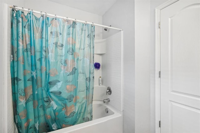 bathroom with shower / bath combination with curtain