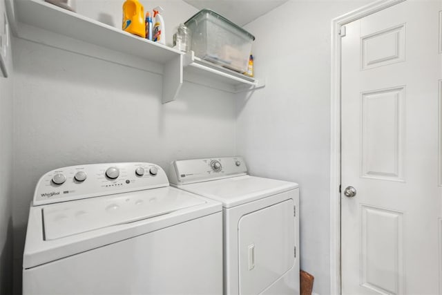 laundry room with washer and dryer