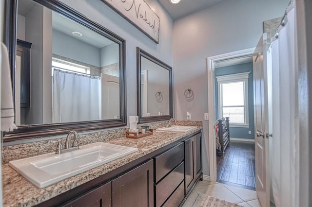 bathroom featuring vanity and hardwood / wood-style flooring