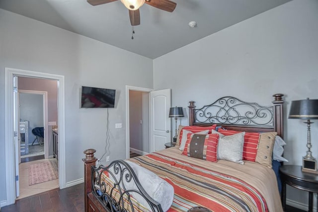 bedroom featuring ceiling fan and dark wood-type flooring