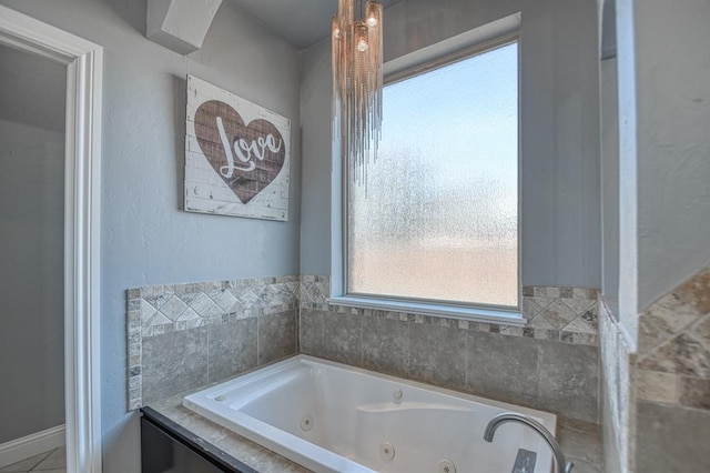 bathroom featuring a relaxing tiled tub