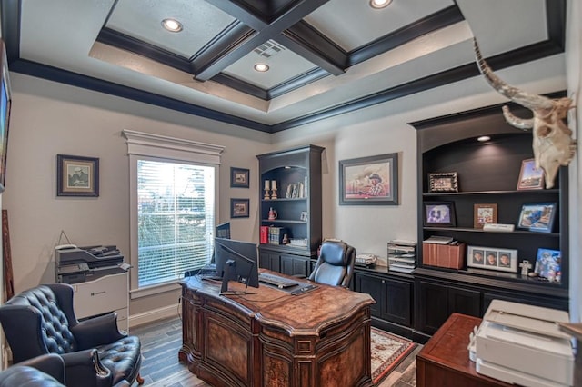 office space with beam ceiling, hardwood / wood-style floors, coffered ceiling, and ornamental molding