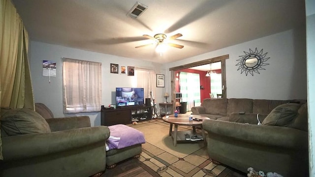 living room with ceiling fan