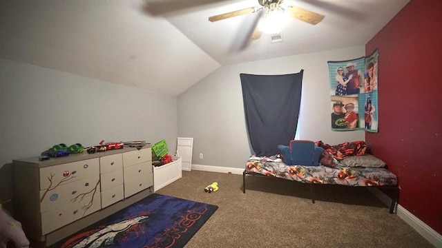 bedroom with ceiling fan, dark carpet, and lofted ceiling