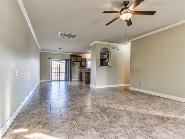 unfurnished living room featuring ceiling fan with notable chandelier and ornamental molding