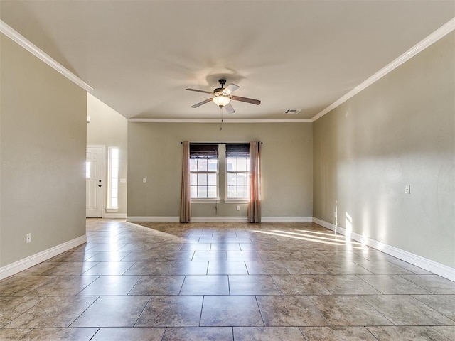 empty room featuring ceiling fan and crown molding