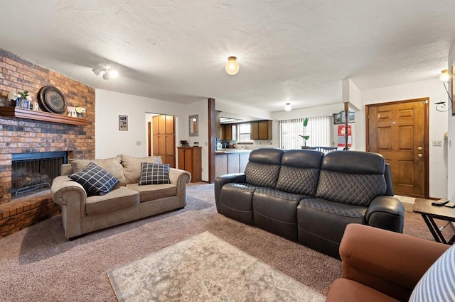 carpeted living room featuring a fireplace