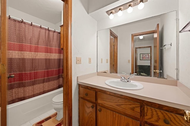 full bathroom with tile patterned floors, vanity, toilet, and shower / bath combo