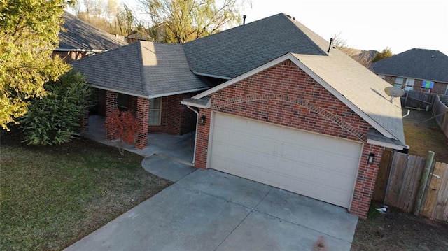 front facade with a garage