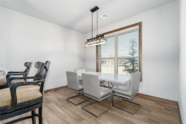 dining room featuring light hardwood / wood-style floors