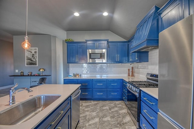 kitchen with premium range hood, sink, stainless steel appliances, and blue cabinets