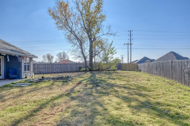 view of yard featuring a fenced backyard