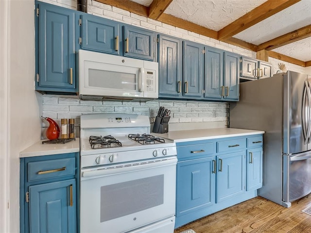 kitchen with decorative backsplash, white appliances, blue cabinetry, light hardwood / wood-style flooring, and beamed ceiling