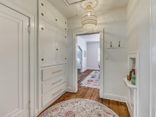 hallway with wood-type flooring