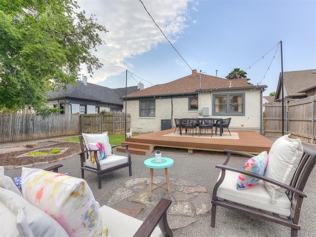 view of patio / terrace featuring outdoor lounge area and a deck