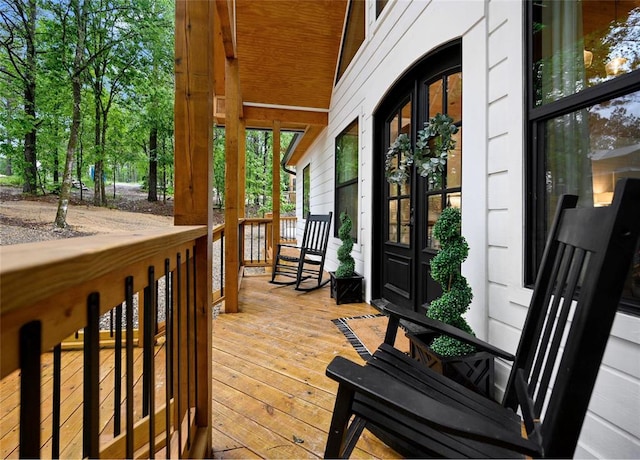 wooden deck featuring french doors