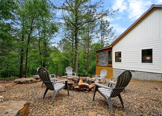 view of patio / terrace featuring an outdoor fire pit