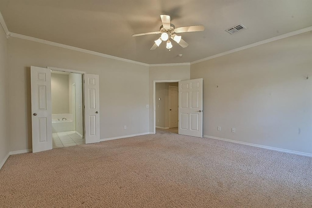 unfurnished bedroom featuring light colored carpet, ceiling fan, and ornamental molding