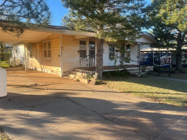 view of front of house with a carport