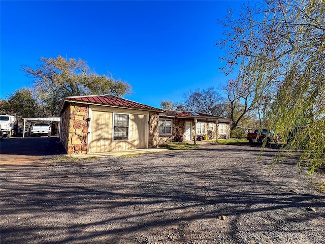 view of front of home featuring metal roof