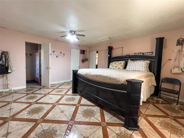 520 S Main St, Lexington, OK 73051 - bedroom with light tile patterned floors and ceiling fan
