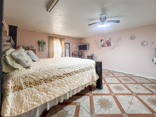 520 S Main St, Lexington, OK 73051 - bedroom with light tile patterned floors and ceiling fan