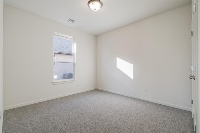 spare room with carpet floors