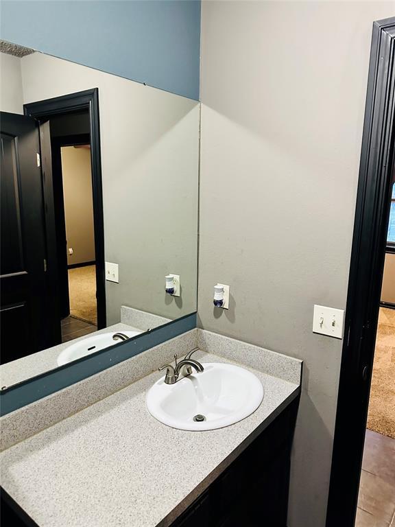 8912 Muriel Way, Spencer, OK 73084 - bathroom featuring vanity and tile patterned floors