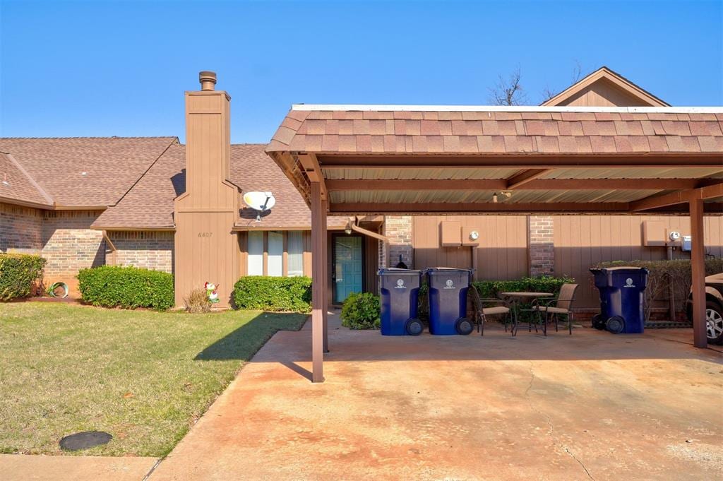 view of patio featuring a carport