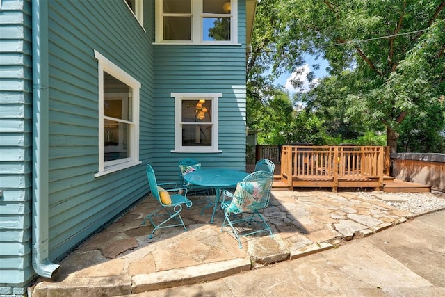 view of patio with a wooden deck