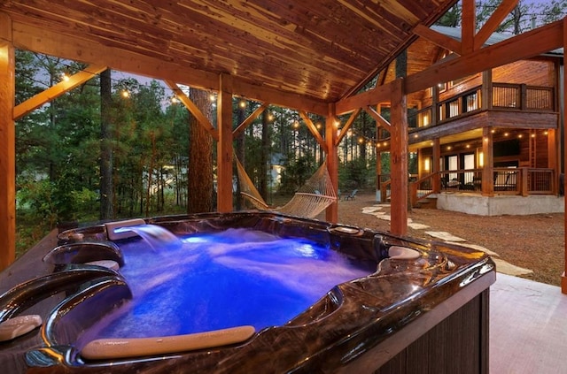 view of pool featuring a hot tub