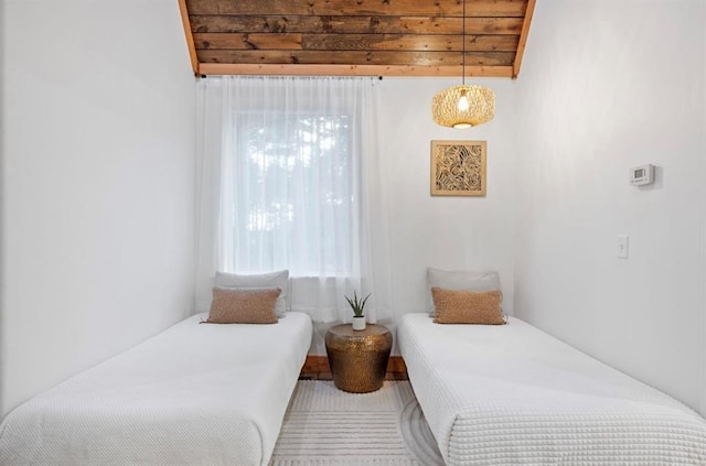 bedroom featuring multiple windows