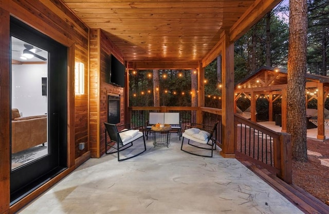 sunroom with wooden ceiling