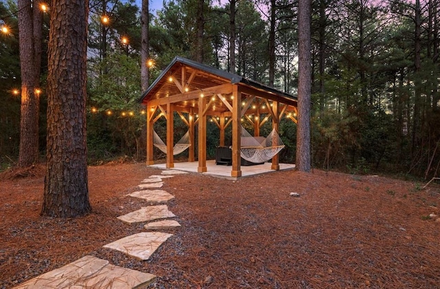 view of yard featuring a gazebo and a patio