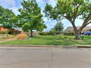 exterior space with a front yard