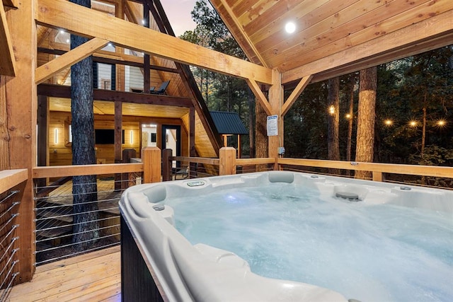 exterior space featuring a hot tub