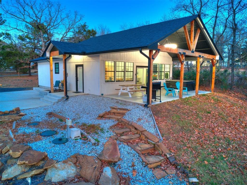 rear view of property with a patio area