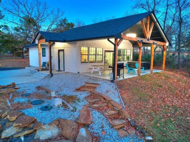 rear view of property with a patio area