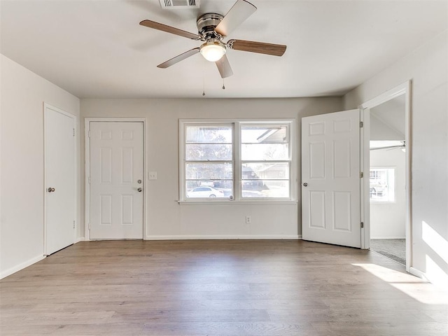 entrance foyer with light hardwood / wood-style floors and ceiling fan