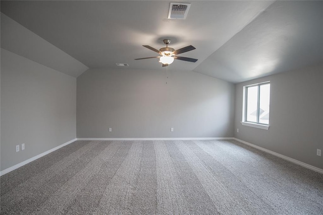 bonus room with carpet flooring, vaulted ceiling, and ceiling fan