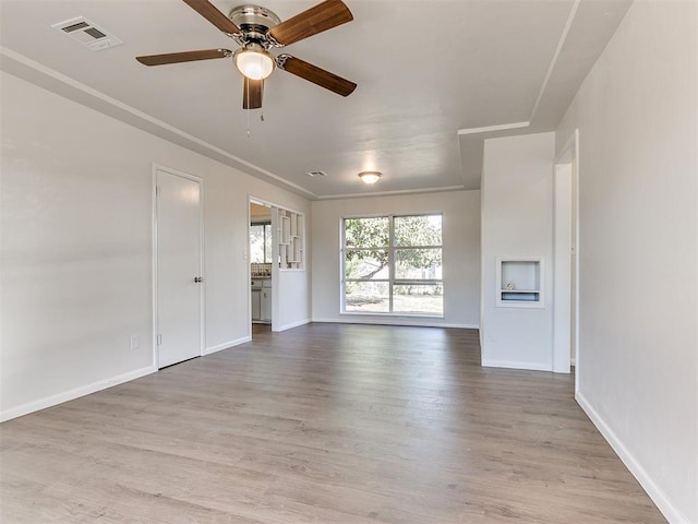 unfurnished room with light hardwood / wood-style floors and ceiling fan