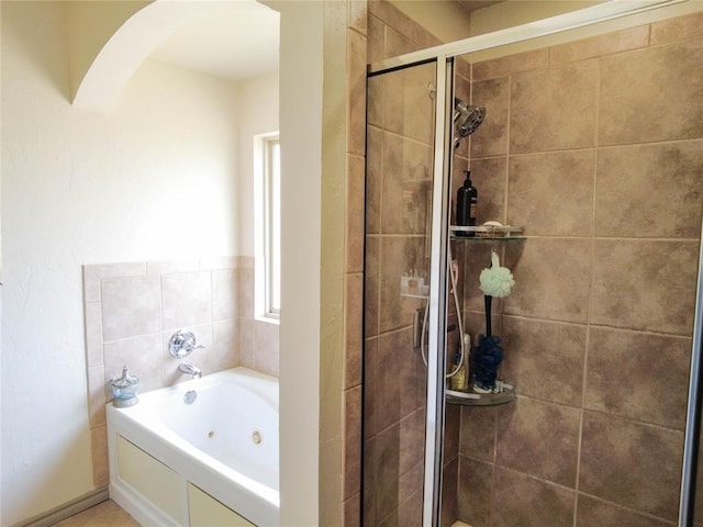 bathroom with independent shower and bath