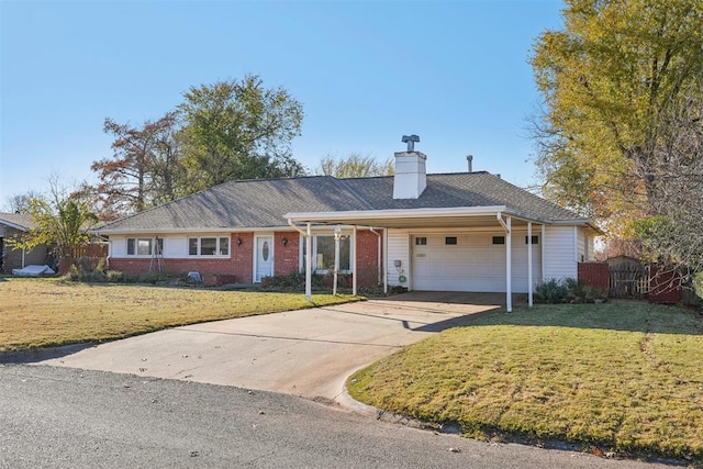 single story home with a front yard and a garage