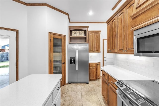 kitchen with crown molding, open shelves, tasteful backsplash, light countertops, and appliances with stainless steel finishes