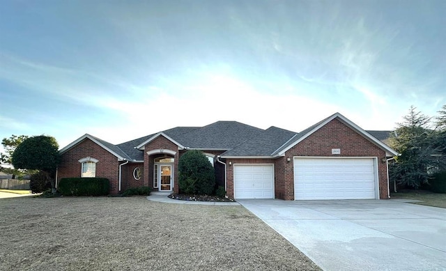 ranch-style house featuring a garage