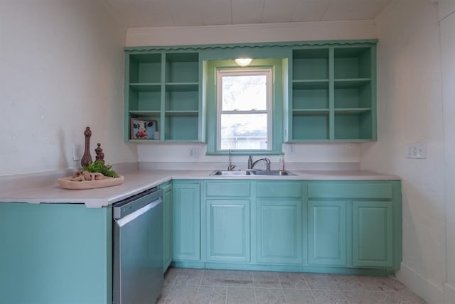 kitchen featuring light tile patterned floors, stainless steel dishwasher, and sink